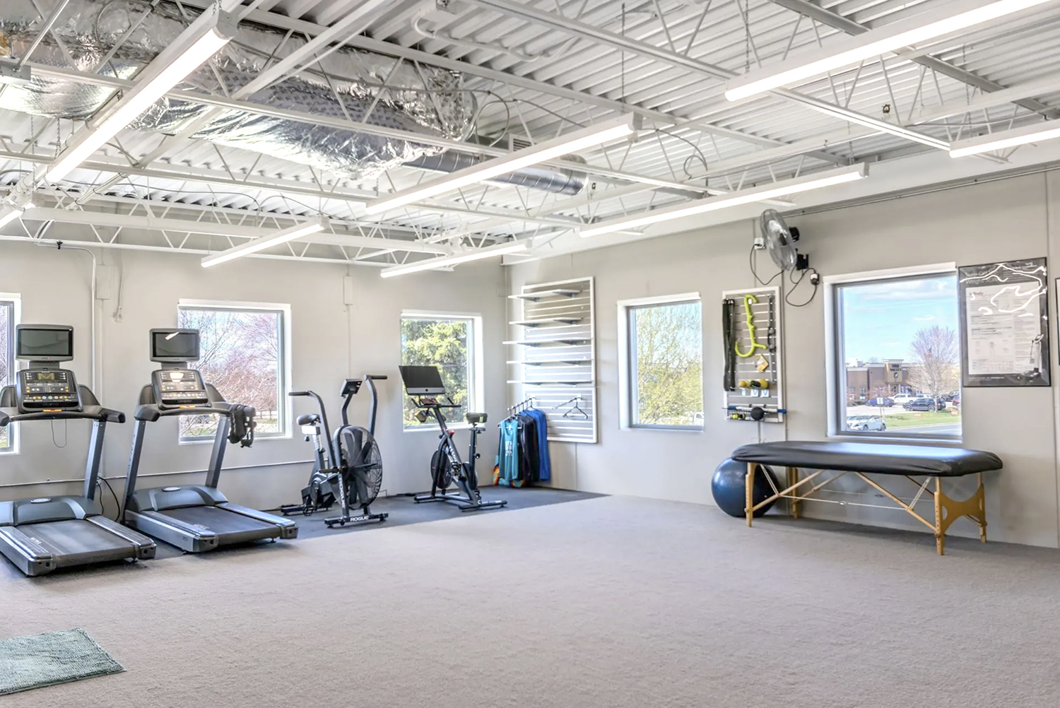 Turf and lifting platforms inside the Elevate gym